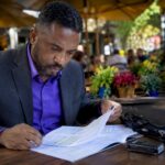 Energy assessor reviewing commercial EPC documents