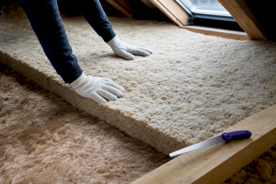 Loft insulation being topped up