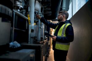 Assessor inspecting commercial building services