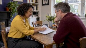 Assessor explains EPC report to homeowner