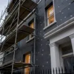 Rental townhouse prepared for insulation work