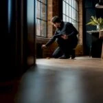 EPC assessor surveying rental property interior
