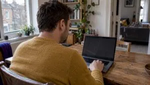 Homeowner checking an EPC register on a laptop