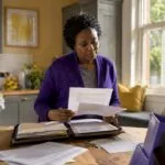 Landlord reviewing UK energy regulation papers